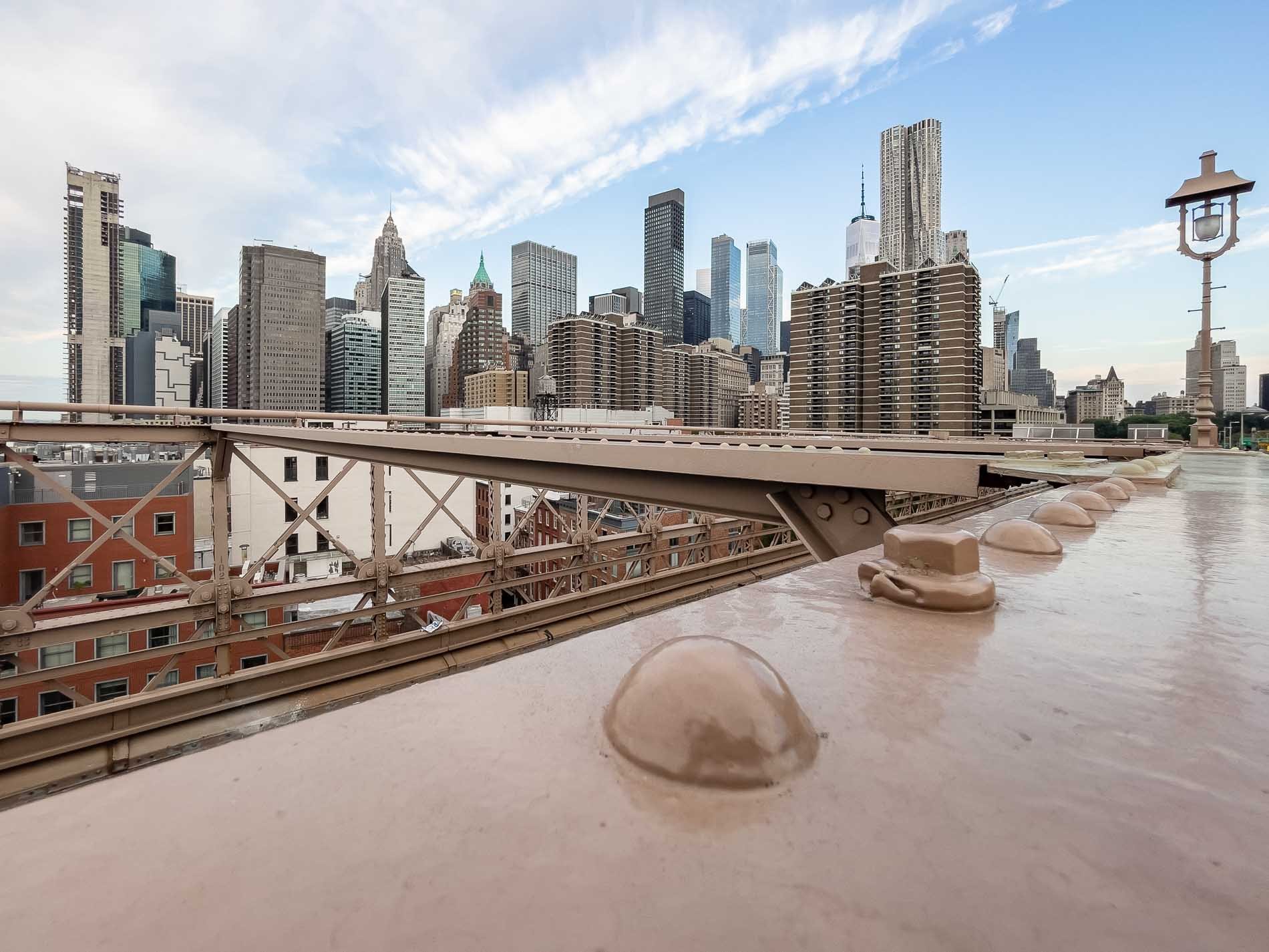 Brooklyn Bridge At Sunrise Overlooking The East River